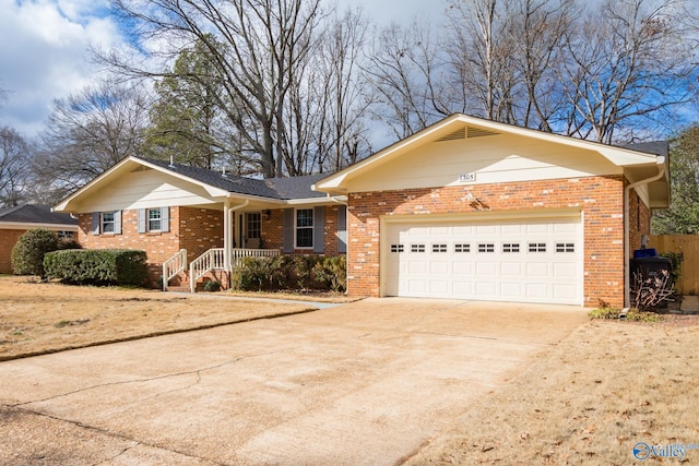 ranch-style house featuring a garage