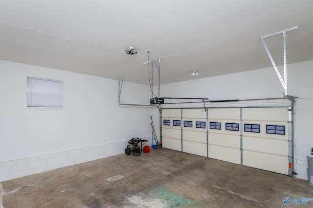 garage featuring a garage door opener