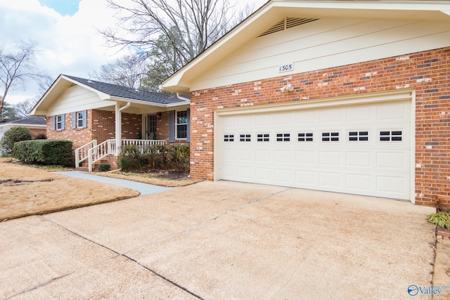 view of front facade featuring a garage and covered porch