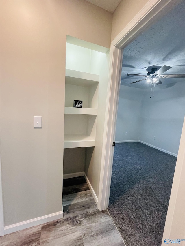 interior space with hardwood / wood-style flooring and built in features