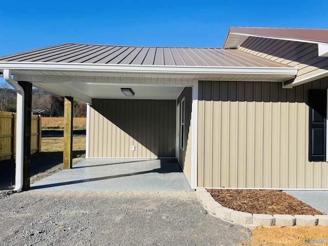 exterior space with a carport