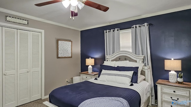 bedroom featuring crown molding, carpet, ceiling fan, and a closet