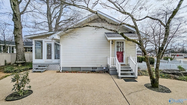 bungalow-style home featuring a patio