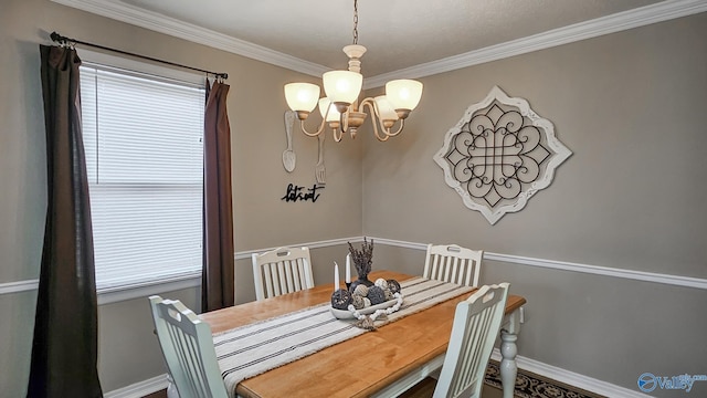 dining space with a notable chandelier and ornamental molding