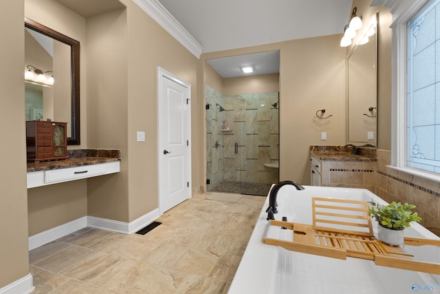 full bath featuring a stall shower, baseboards, crown molding, vanity, and a freestanding tub