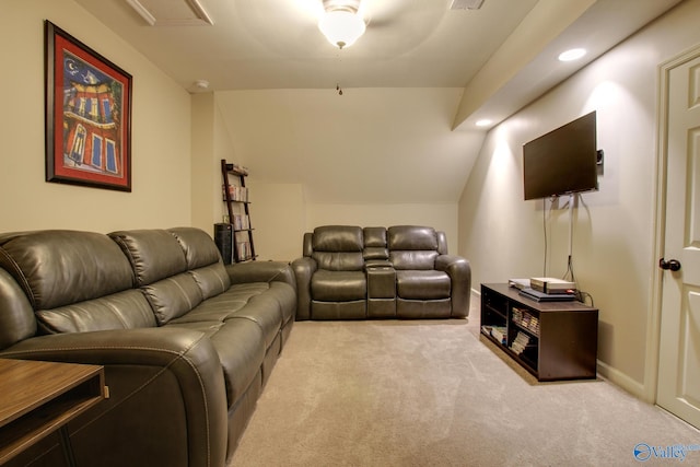 carpeted living room featuring recessed lighting and vaulted ceiling