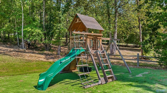 community play area with a lawn
