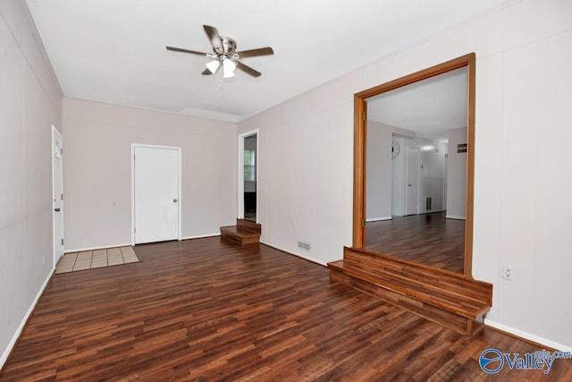 303 Bobwhite Dr SW, Decatur, AL 35601 - empty room featuring visible vents, baseboards, ceiling fan, and wood finished floors