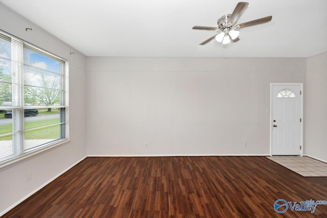 303 Bobwhite Dr SW, Decatur, AL 35601 - interior space featuring baseboards, ceiling fan, and wood finished floors