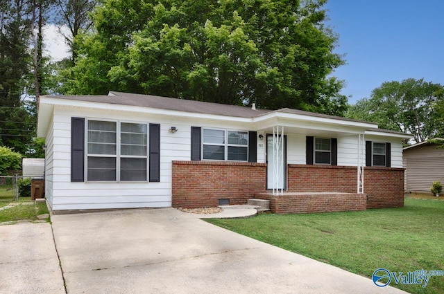 303 Bobwhite Dr SW, Decatur, AL 35601 - ranch-style house with a porch, brick siding, and a front yard