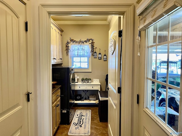 94 Owensby Way, Trinity, AL 35673 - washroom with crown molding, cabinet space, washer / clothes dryer, and dark tile patterned floors