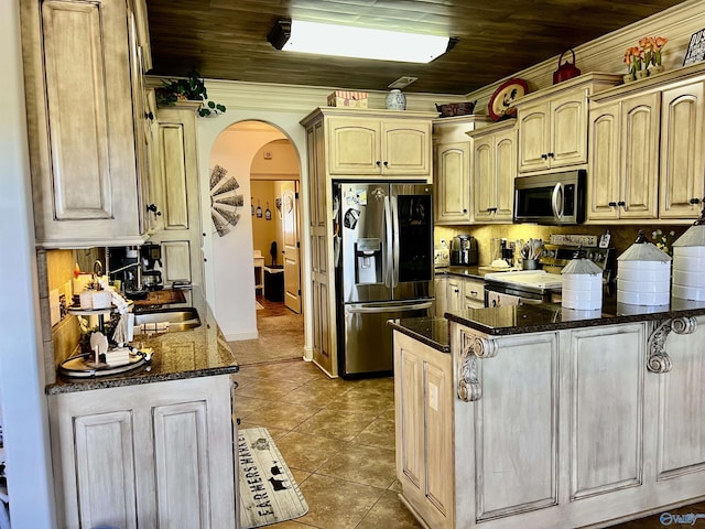 94 Owensby Way, Trinity, AL 35673 - kitchen with stainless steel appliances, a peninsula, arched walkways, tile patterned flooring, and wood ceiling