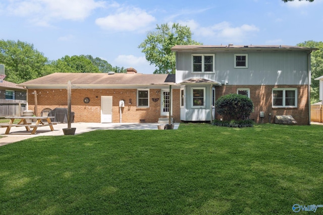 9410 Valley Ln, Huntsville, AL 35803 - back of house featuring a patio area, brick siding, and entry steps