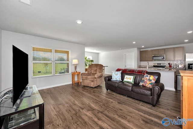 living room with dark wood-type flooring