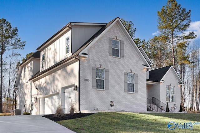 view of side of home featuring central AC unit, a garage, and a lawn