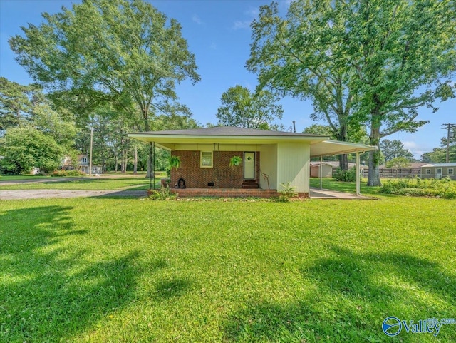605 Hereford Dr, Athens, AL 35611 - view of front facade featuring a front lawn and a carport