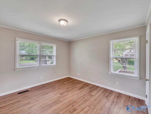 605 Hereford Dr, Athens, AL 35611 - unfurnished room with wood finished floors, ornamental molding, and baseboards