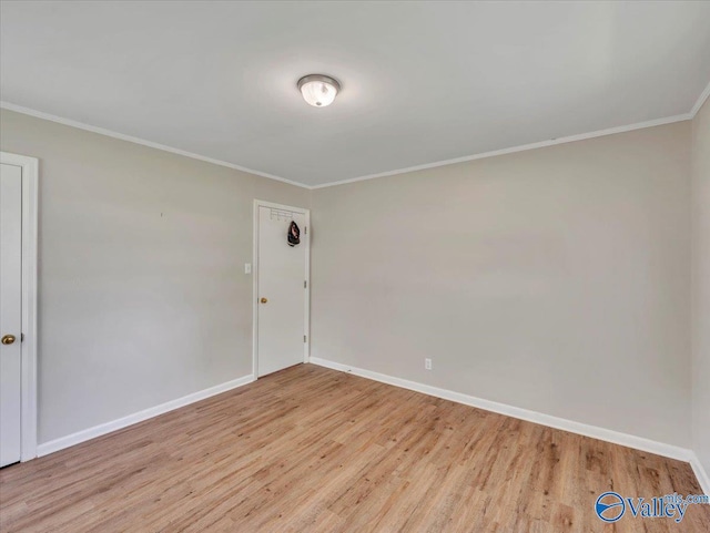 605 Hereford Dr, Athens, AL 35611 - spare room with wood finished floors, crown molding, and baseboards