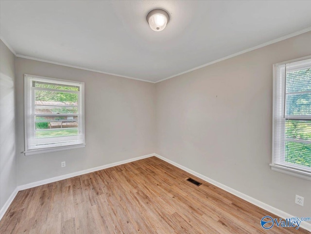 605 Hereford Dr, Athens, AL 35611 - unfurnished room featuring wood finished floors, baseboards, and crown molding