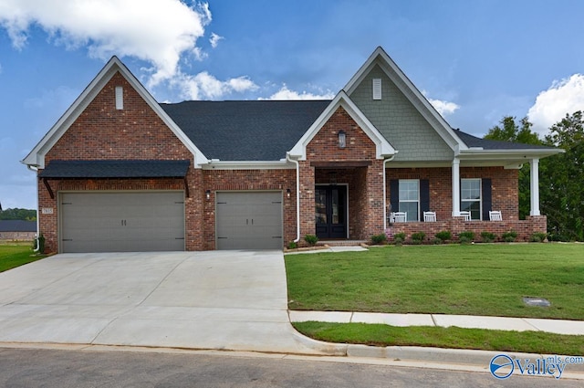 craftsman-style house featuring a front yard