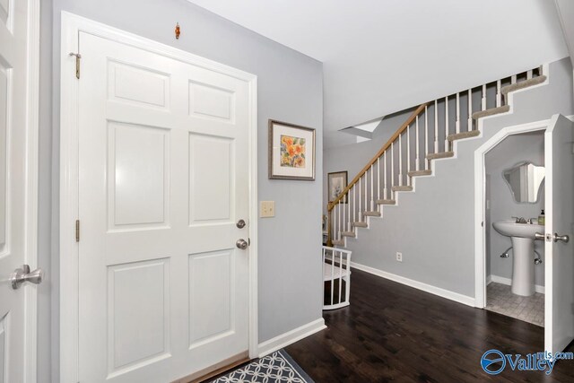 211 Kent Rd SW, Huntsville, AL 35801 - entrance foyer featuring stairs, baseboards, and wood finished floors