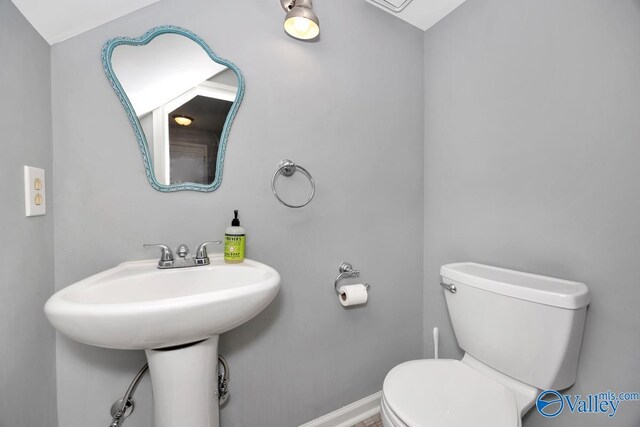 211 Kent Rd SW, Huntsville, AL 35801 - bathroom with toilet and baseboards