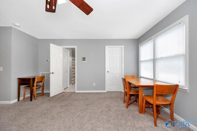 211 Kent Rd SW, Huntsville, AL 35801 - carpeted dining space with a ceiling fan and baseboards