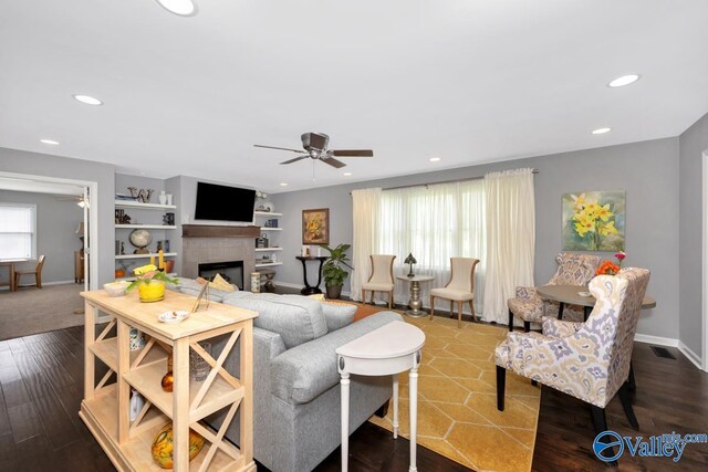 211 Kent Rd SW, Huntsville, AL 35801 - living area with ceiling fan, recessed lighting, a fireplace, dark wood finished floors, and baseboards