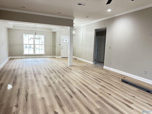 unfurnished living room with visible vents, baseboards, light wood-style flooring, ornamental molding, and ceiling fan with notable chandelier