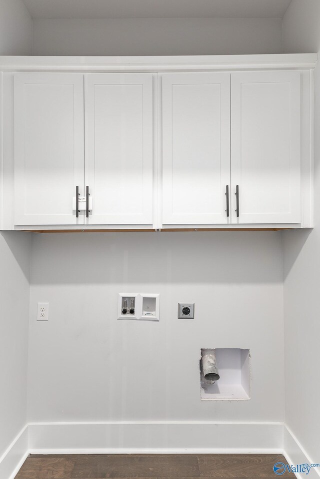 laundry area with electric dryer hookup, dark wood-type flooring, cabinets, and hookup for a washing machine