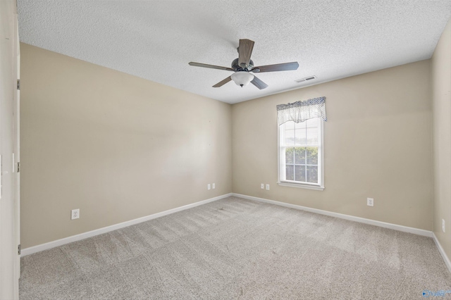 221 Badger Dr, Harvest, AL 35749 - carpeted spare room with ceiling fan, baseboards, and a textured ceiling