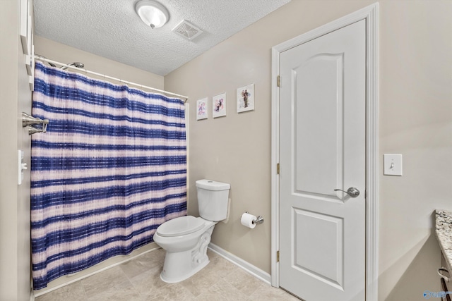 221 Badger Dr, Harvest, AL 35749 - full bathroom with toilet, a textured ceiling, baseboards, tile patterned flooring, and curtained shower