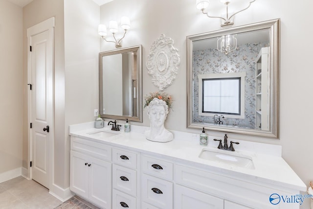 bathroom with dual vanity and tile patterned floors