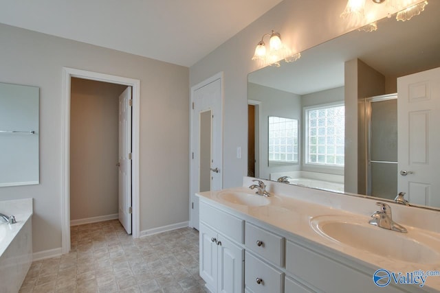 bathroom with independent shower and bath and vanity