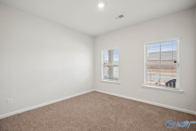 unfurnished room with carpet