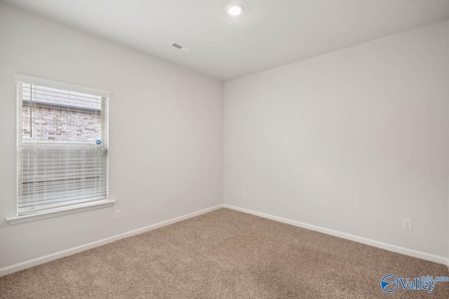 empty room with carpet floors