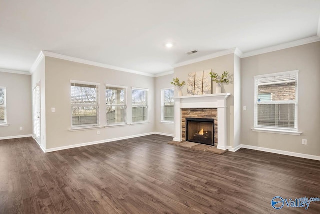 unfurnished living room with crown molding, dark hardwood / wood-style floors, and a fireplace