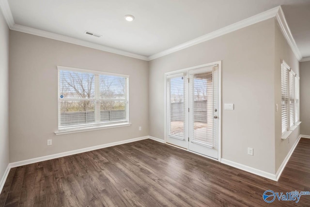 unfurnished dining area with ornamental molding and dark wood-type flooring