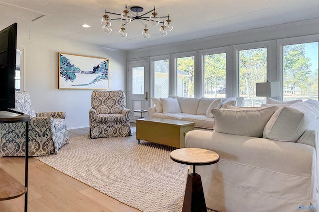 living room featuring hardwood / wood-style floors and a healthy amount of sunlight