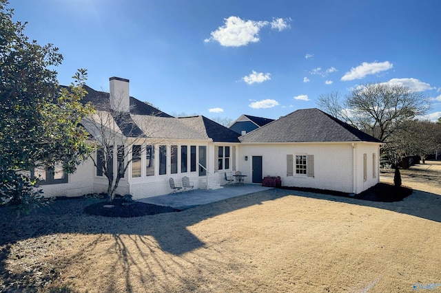 rear view of house with a patio area
