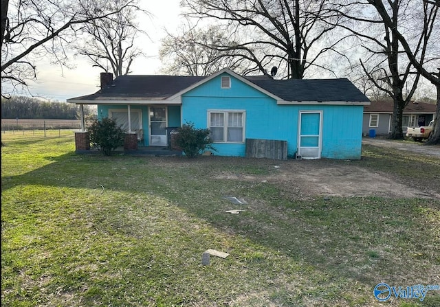 view of front of home with a front yard