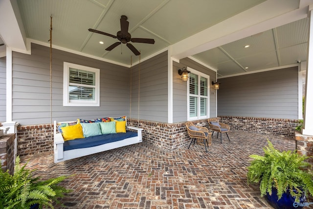 view of patio / terrace featuring a ceiling fan