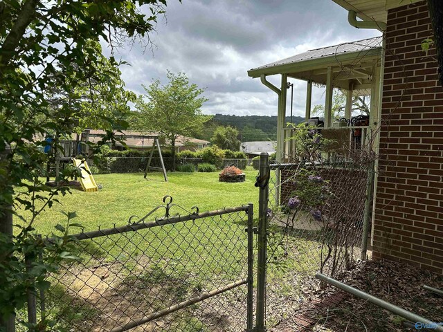 view of yard featuring a gate