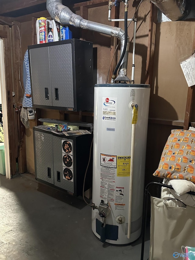 utility room with gas water heater