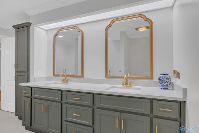 bathroom featuring a sink, double vanity, and crown molding