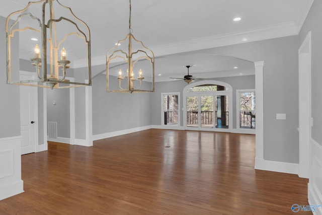 unfurnished living room featuring baseboards, ceiling fan, ornamental molding, recessed lighting, and wood finished floors