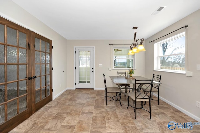 dining area with visible vents, french doors, and baseboards