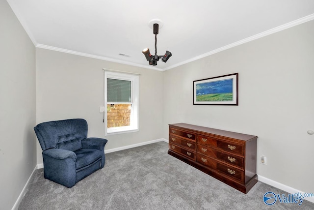 living area with ornamental molding, baseboards, and carpet floors