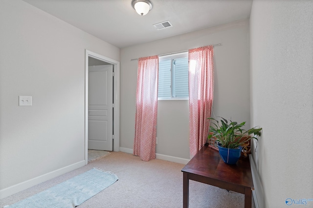 interior space featuring carpet flooring