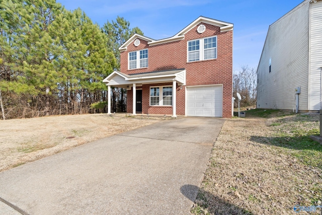 view of front facade featuring a front lawn, a porch, and a garage